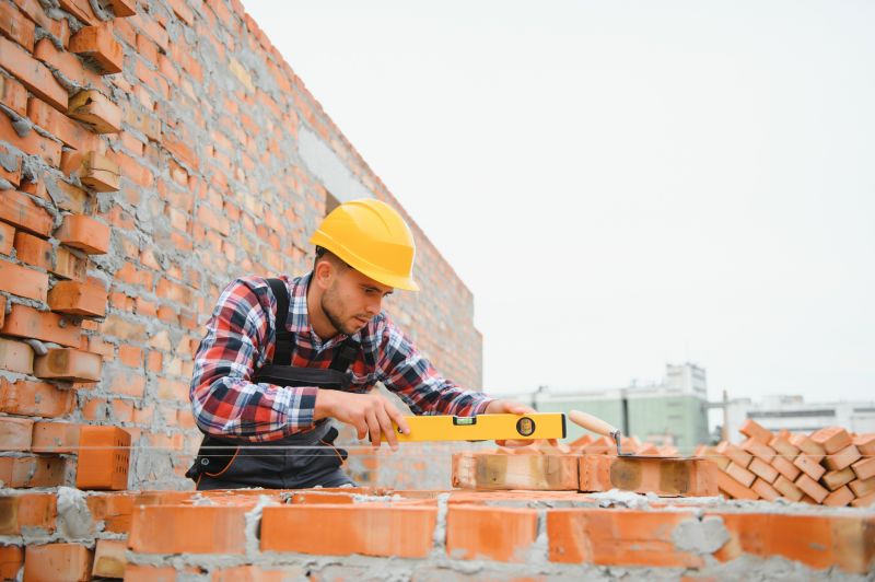 Bricklayer Performing Repairs